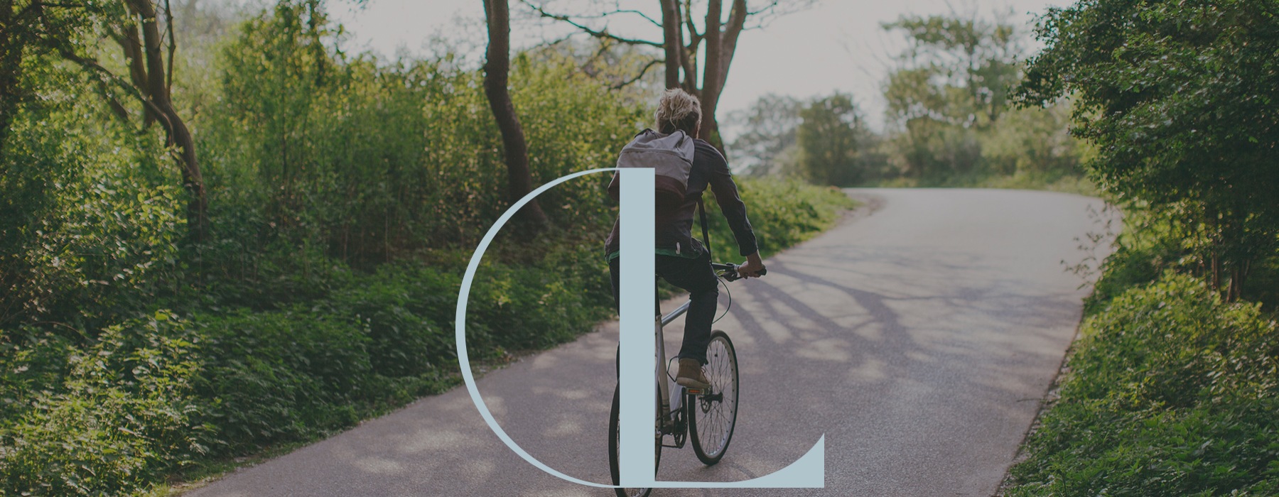 a person riding a bicycle throughout a trail