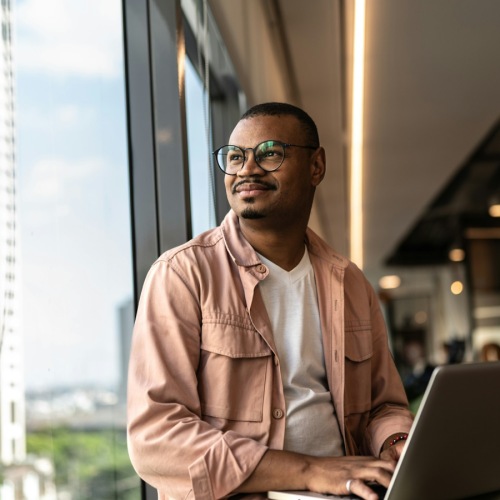a man on his laptop indoors