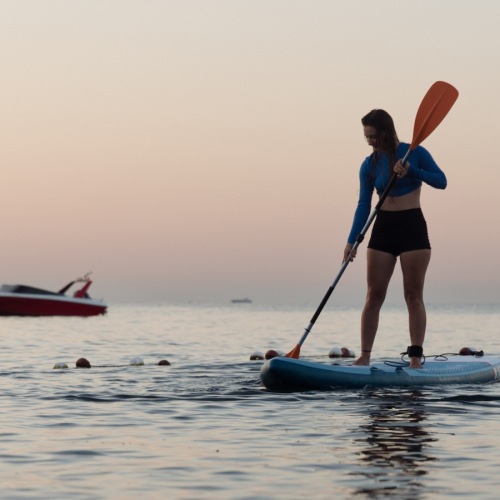 a woman on a surf board
