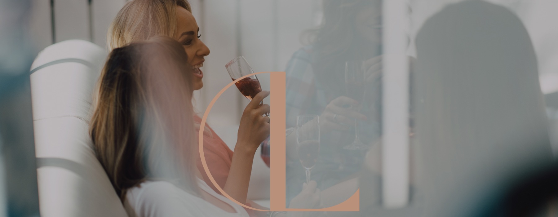 a woman holding a wine glass